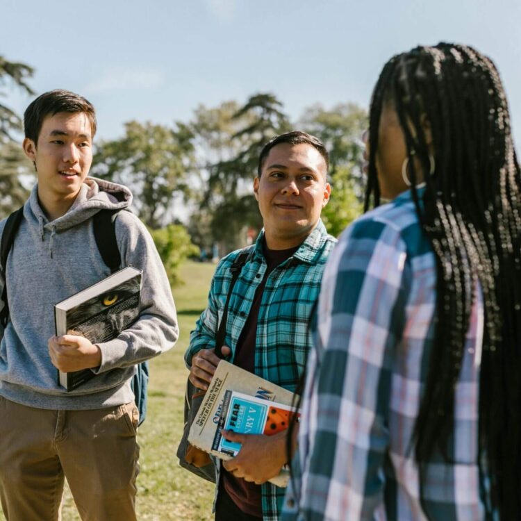 Three students talking