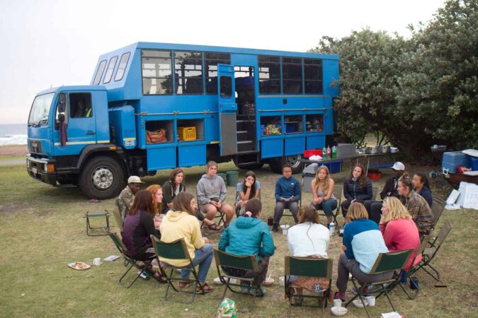 Image of students meeting on a Traveling School trip