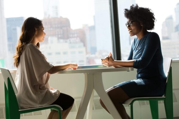 People meeting by a window
